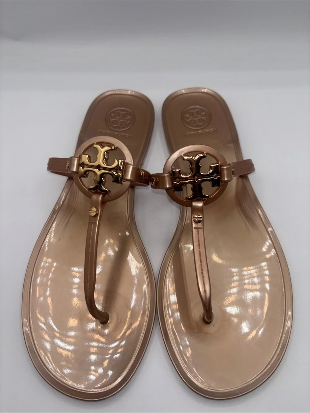 Tory Burch Metallic Rose Gold Logo Jelly Thong Sandals
